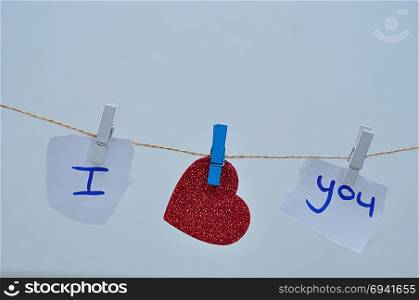 I love you hanging on a rope where love is replaced with a red heart