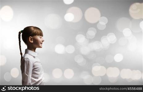 I wish............ Side view of girl with closed eyes against bokeh background