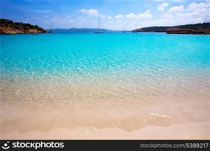 Ibiza Cala Bassa beach with turquoise Mediterranean sea at Balearic Islands