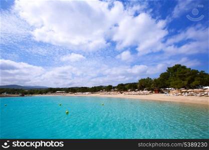 Ibiza Cala Bassa beach with turquoise Mediterranean sea at Balearic Islands