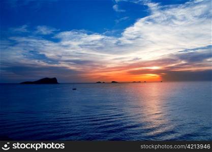 Ibiza cala Conta Conmte sunset with bledas and esparto islands