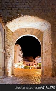 Ibiza castle fort door to Dalt Vila in Eivissa town with night lights