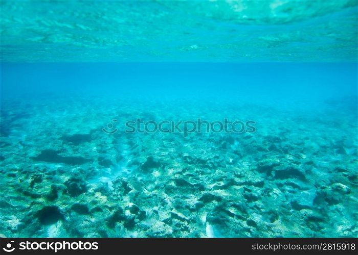 Ibiza Formentera underwater rocks in turquoise sea horizon