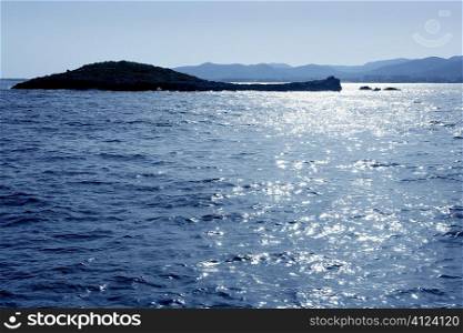 Ibiza mediterranean island blue seascape with rocks