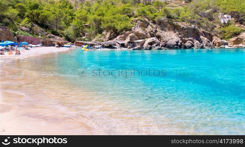 Ibiza Port de Benirras beach with turquoise mediterranean sea in Spain