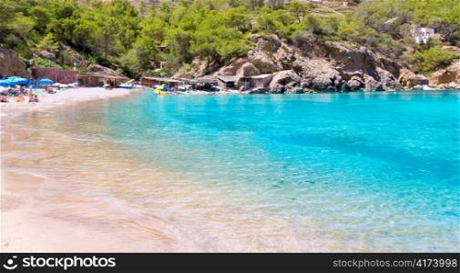 Ibiza Port de Benirras beach with turquoise mediterranean sea in Spain