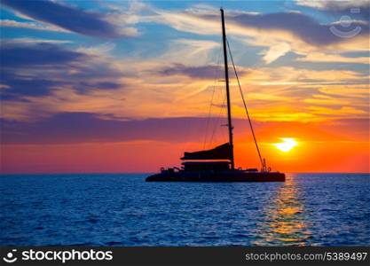 Ibiza san Antonio Abad de Portmany catamaran sailboat sunset with in Balearic islands of spain