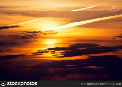 Ibiza sunset from Cala Conta Comte orange sky clouds