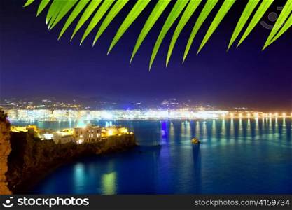 Ibiza town port blue sea night lights of Eivissa city