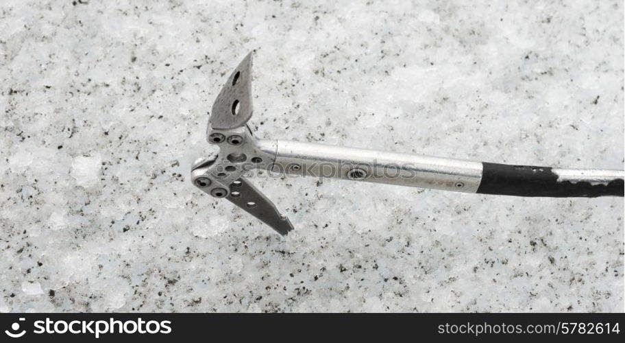 Ice axe in snow, Perito Moreno Glacier, Lake Argentino, Los Glaciares National Park, Santa Cruz Province, Patagonia, Argentina