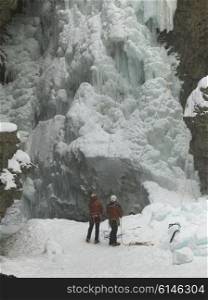 Ice climbers on frozen waterfall, Johnston Canyon, Banff National Park, Alberta, Canada