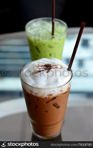 ice coffee and ice green tea on table