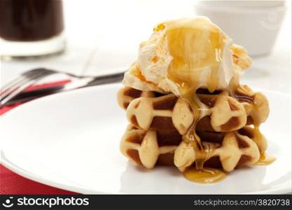Ice cream and waffle dessert with sweet syrup