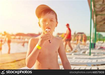 ice-cream. Baby boy with ice-cream at the beach