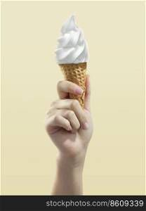 Ice cream cone on yellow background, woman holding ice cream by hand
