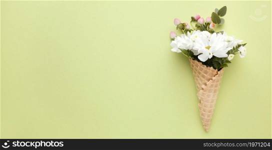 ice cream cone with flowers. High resolution photo. ice cream cone with flowers. High quality photo