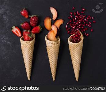 ice cream cones with fruits