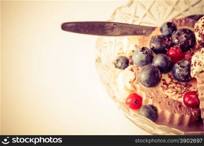 ice cream dessert decorated with berry fruit