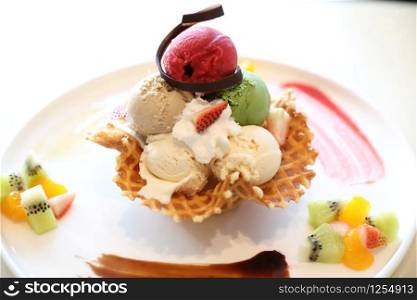 ice cream on waffle and fruit topping