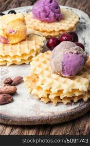 ice cream on waffles. Ice cream on baked wafers with cherries
