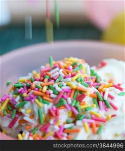 Ice Cream Showing Sprinkles Topping And Decorations