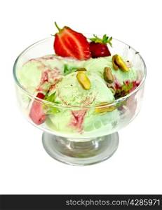 Ice cream strawberry and pistachio in a glass goblet with strawberries and pistachios isolated on white background