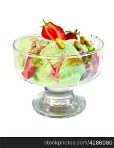 Ice cream strawberry and pistachio in a glass with strawberries and pistachios isolated on white background