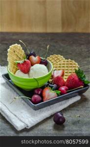 ice cream with berries. Vanilla ice cream scoops with fresh berries fruit