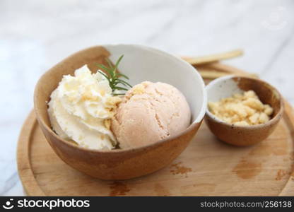 ice cream with cream on wood