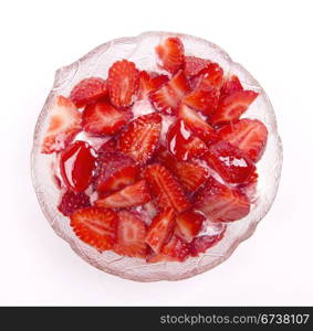 Ice cream with fresh strawberry and syrup