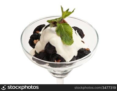ice cream with prunes and walnuts isolated on white