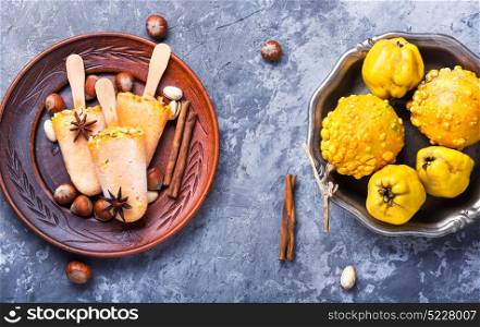 ice cream with pumpkin and nuts. autumn ice cream with pumpkin taste, cinnamon and hazelnut