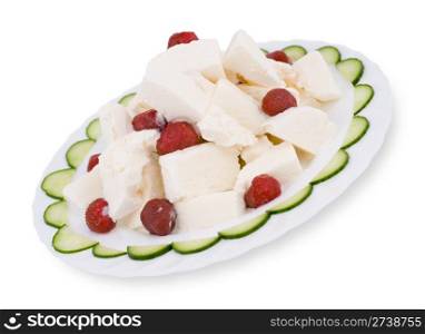 ice-cream with strawberries, decorated with cucumber slices