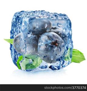 Ice cube with blueberries isolated on white