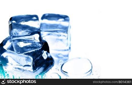 Ice cubes and water drops isolated over white background