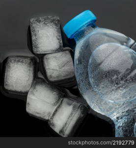 ice cubes bottle water top view