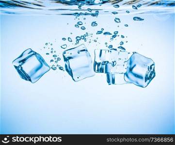 Ice cubes falling into the water sinking to the bottom. Abstract background.