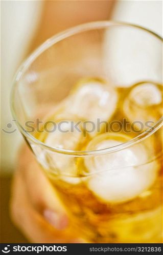 Ice cubes in a glass of wine