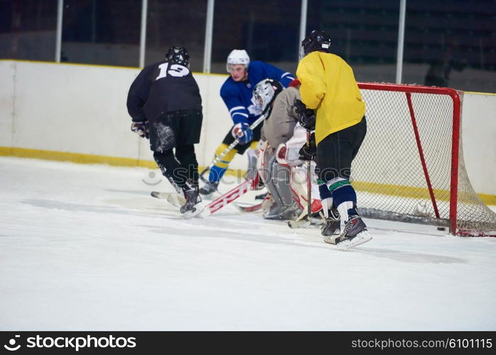 ice hockey goalkeeper player on goal in action