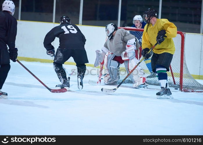 ice hockey goalkeeper player on goal in action