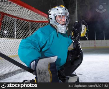 ice hockey goalkeeper player on goal in action