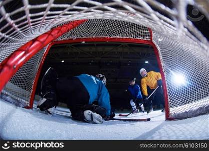 ice hockey goalkeeper player on goal in action