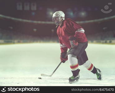 ice hockey player in action kicking with stick. ice hockey player in action