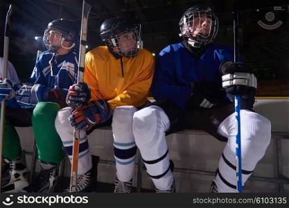 ice hockey players, group of team friends waiting on bench to start game