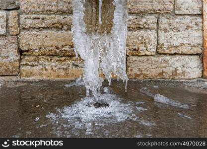 Ice on drainage pipe
