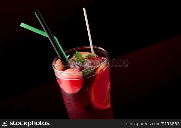 ice tea in a glass on a dark background. cold tea