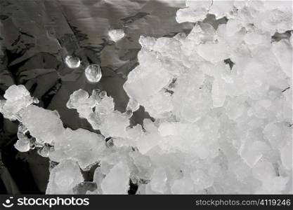 Ice texture over dark silver metal film
