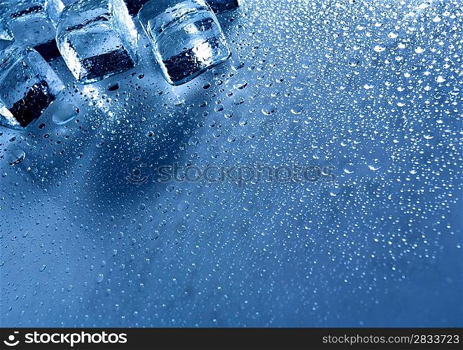 Ice with water droplets over abstract wet background