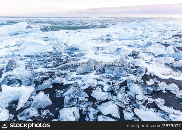 Iceberg beach at Vatnajokull Glacier Jokulsarlon Iceland sunrise