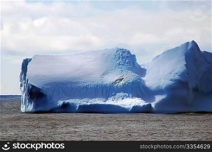 Iceberg in calm waters